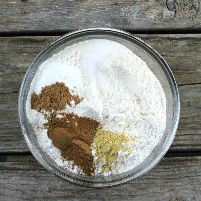 Flour, baking soda, salt, cinnamon, ginger, and nutmeg in a small bowl.