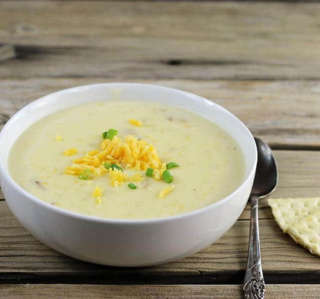 Side angle view of a bowl of potato soup.