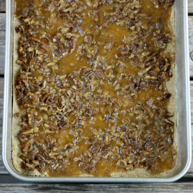 Baked turtle bars in a baking pan.