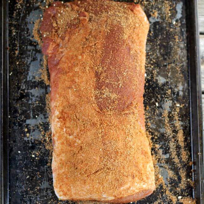 Pork tenderloin with a dry rub on it.