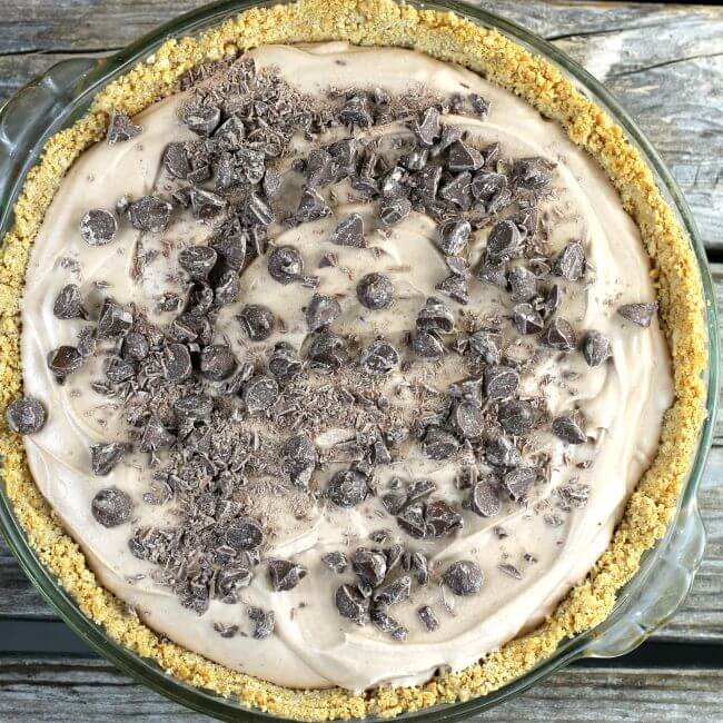 Chocolate pie with chopped chocolate chips on top.