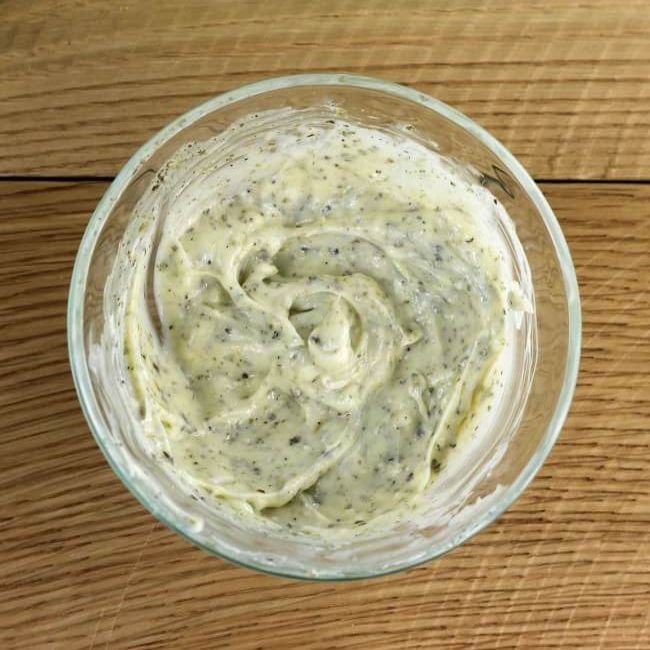 Butter spread in a glass bowl.