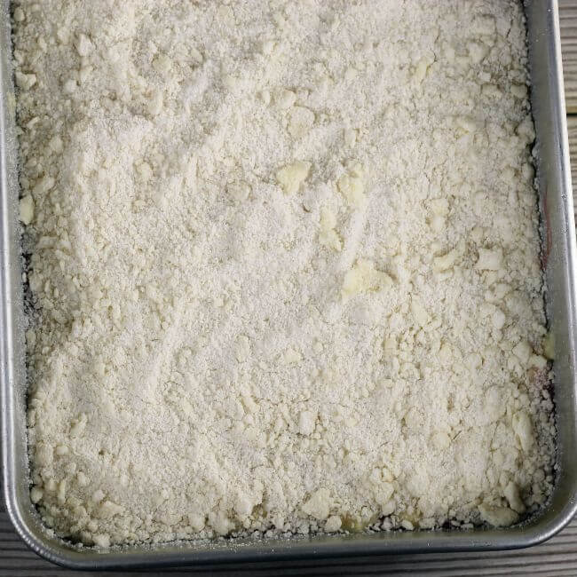 Topping is sprinkled over top of the batter.