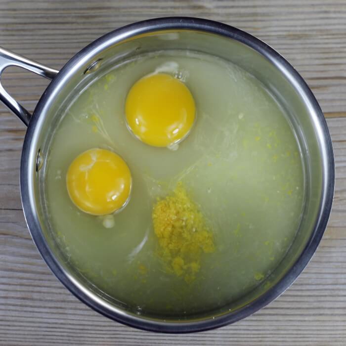 Eggs, sugar, lemon juice, and lemon zest in a saucepan.