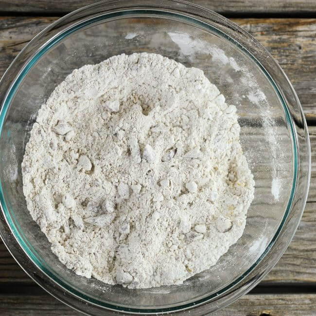 Dry ingredients for carrot muffins in a bowl.