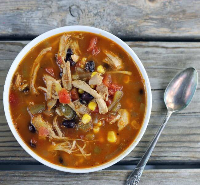 Looking down at a bowl of southwest soup.