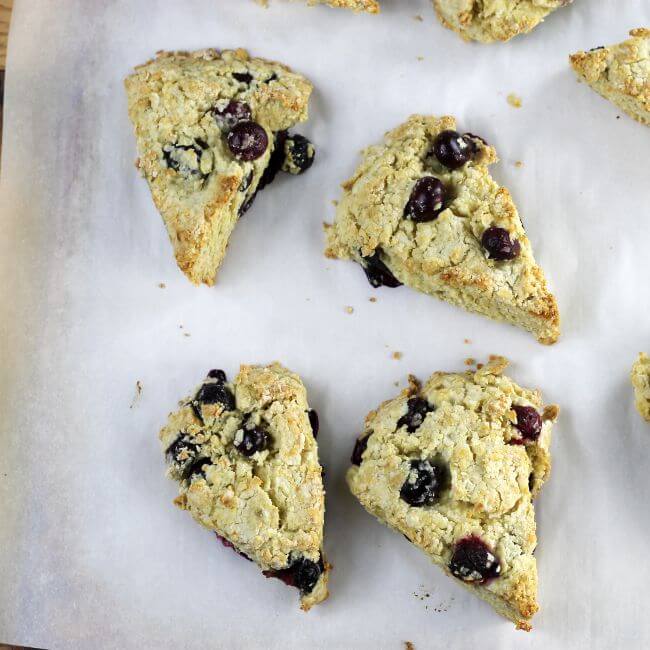 Scones that are baked on a baking sheet.