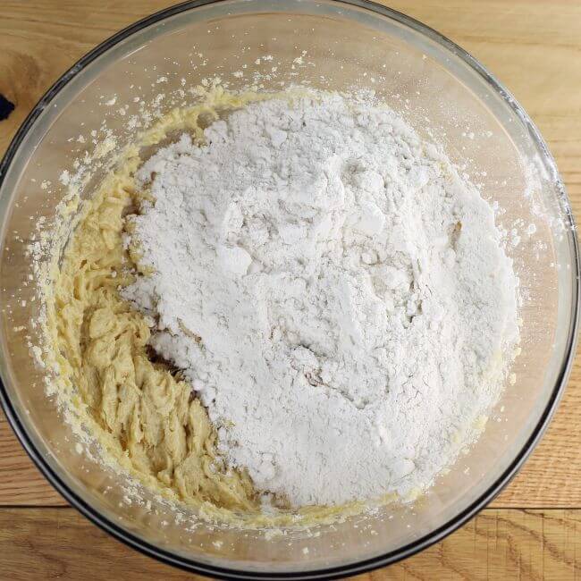 The dry ingredients are added to the mixing bowl.