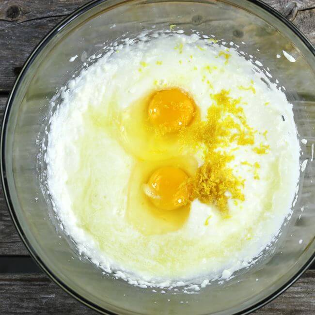 Eggs, lemon zest, and lemon juice added to the batter.