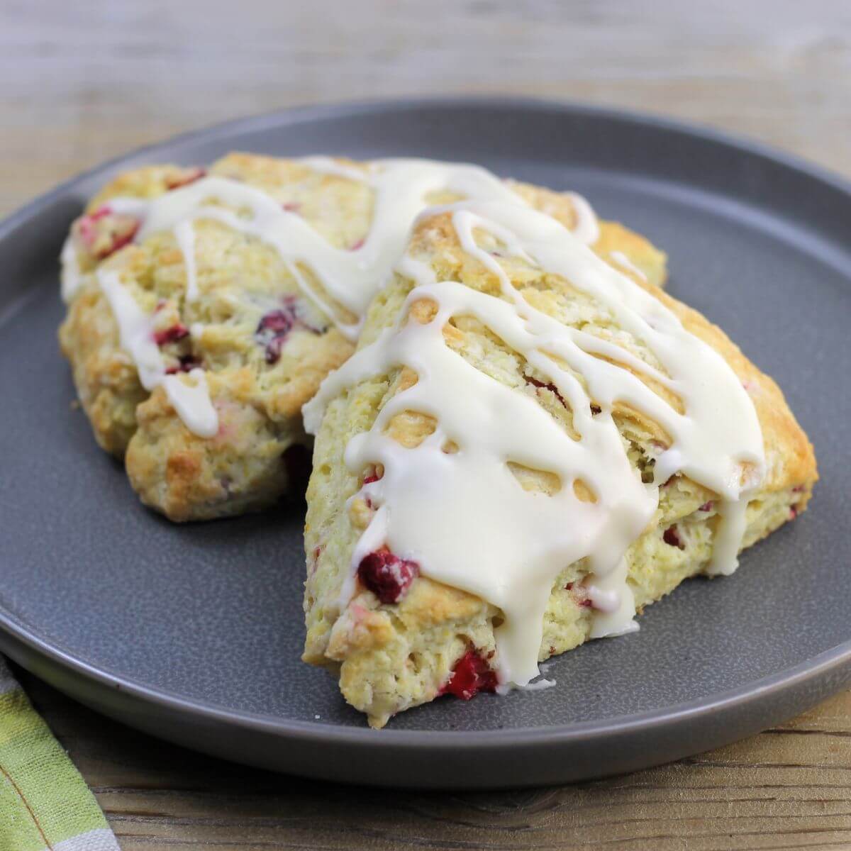 A side angle view of a plate of scones.