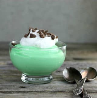 Bowl of Creme de Menthe pudding with spoons on the side.