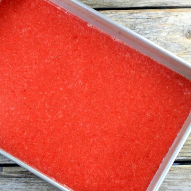 Italian ice added to a 9 by 13-inch baking pan.