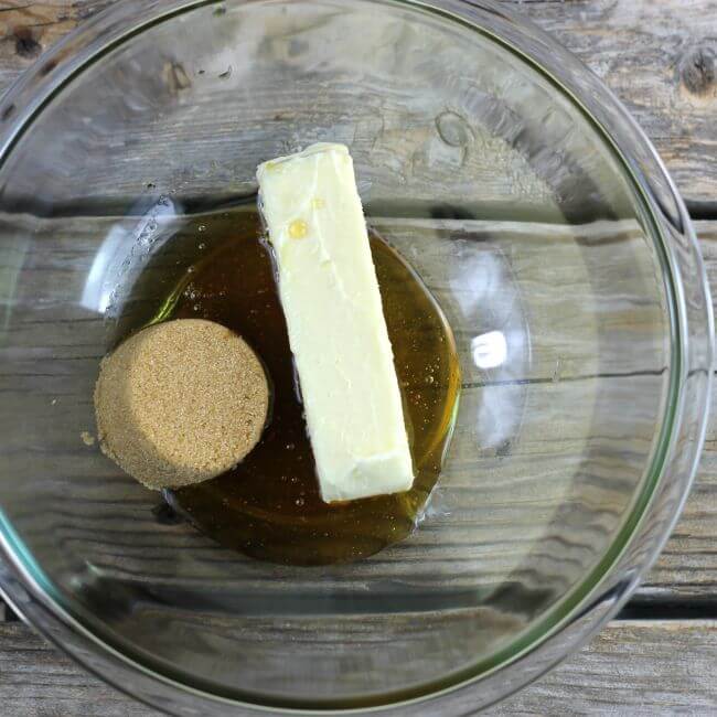 Honey, brown sugar, and butter in a glass bowl.