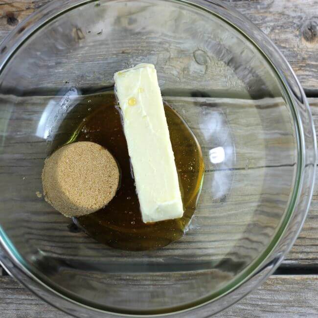 Honey, brown sugar, and butter in a glass bowl.