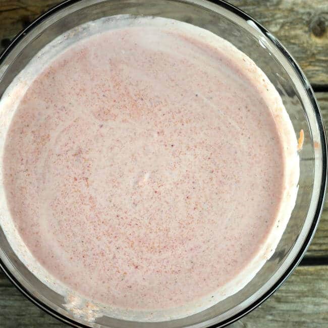 The fruit and yogurt mixture is blended together.