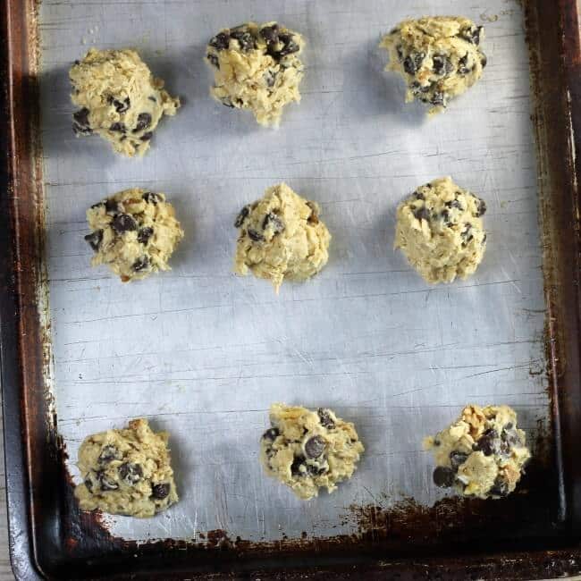 Cookies are ready for baking on a baking sheet.