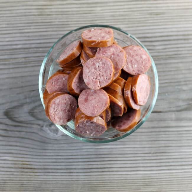 A small bowl of sliced Polish sausage