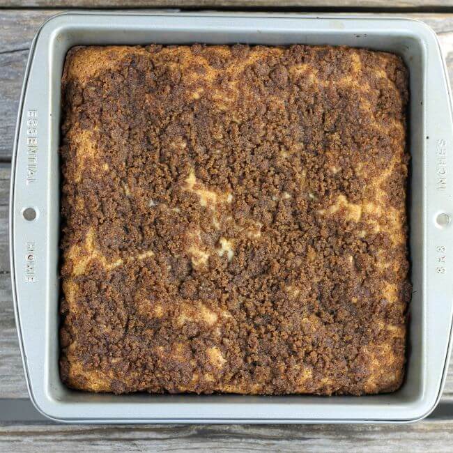Baked coffee cake in a baking pan.