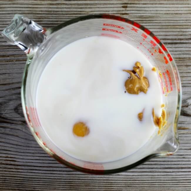 Eggs, milk, vanilla are add to a large bowl.