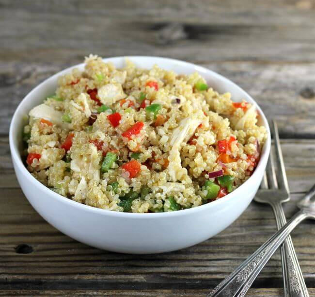 Side angle view of a bowl of quinoa salad.