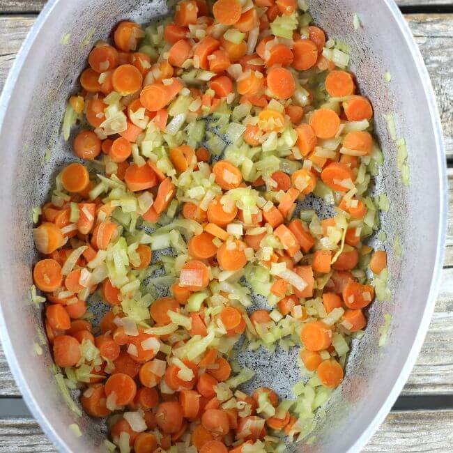Cooked vegetables in a Dutch oven.
