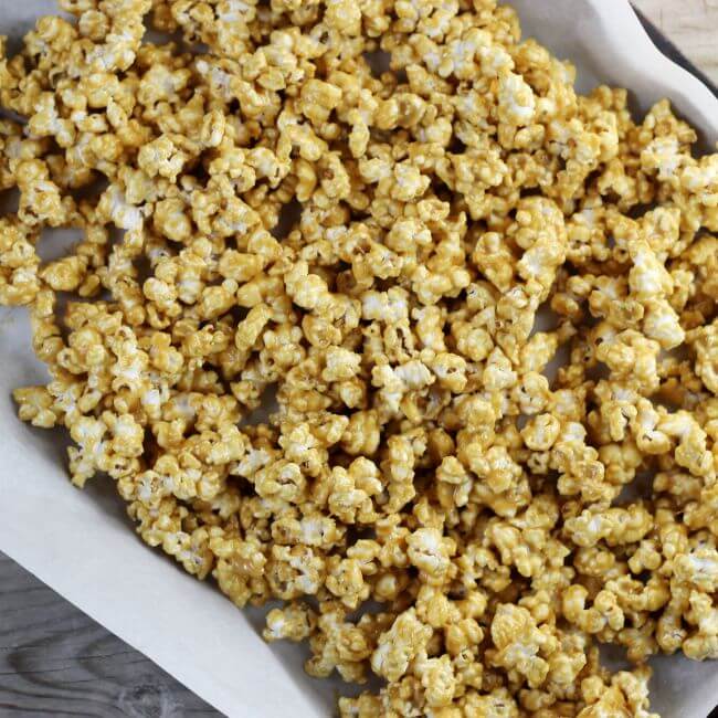 A baking pan filled with popcorn.