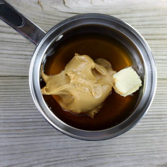Peanut butter, honey, and butter in a small saucepan.