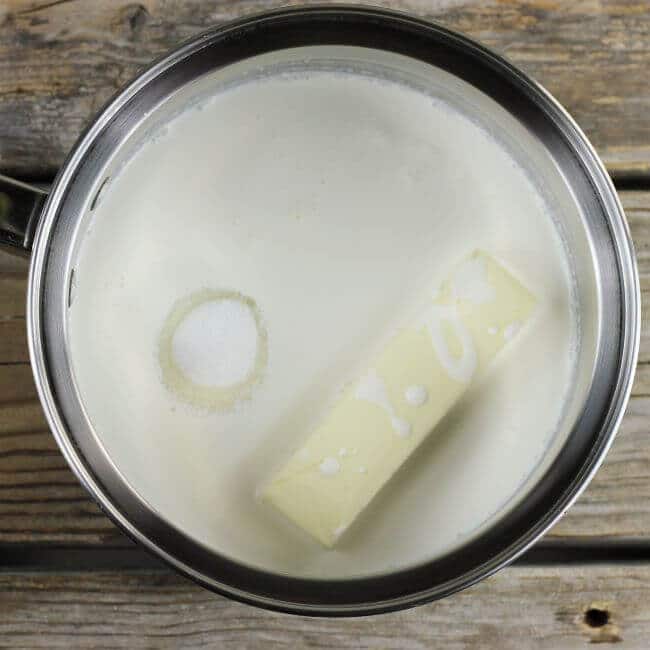 Butter, sugar, and cream are added to a medium saucepan.