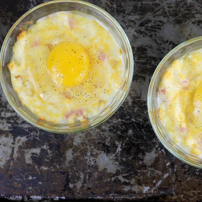 Eggs are placed on top of the baked mashed potatoes. 