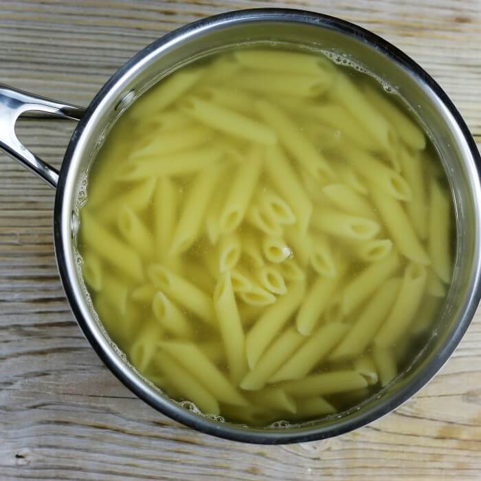 Cooked pasta in a saucepan.