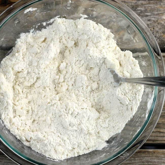 Butter has been mixed into the flour mixture.