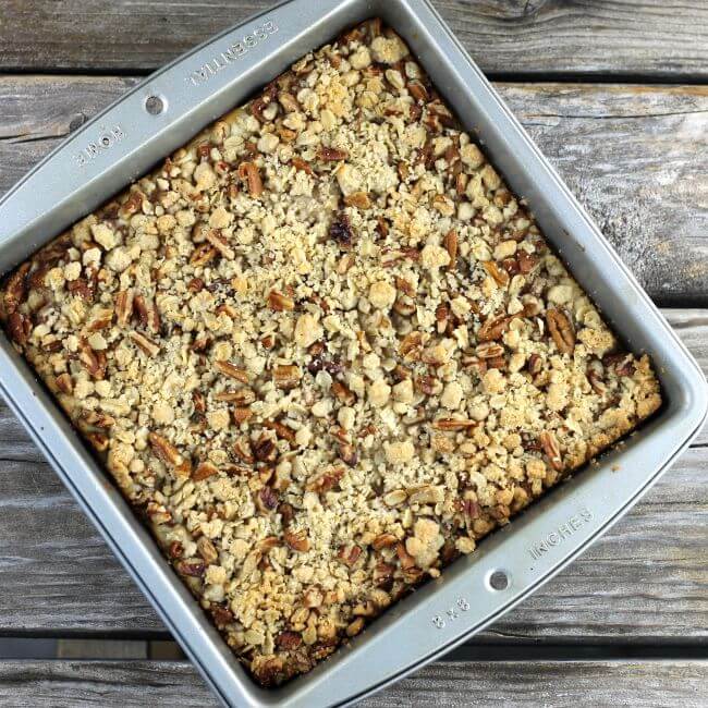 Baked pear cream cheese bars in a baking pan.