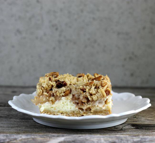 Pear cream cheese bar on a white plate