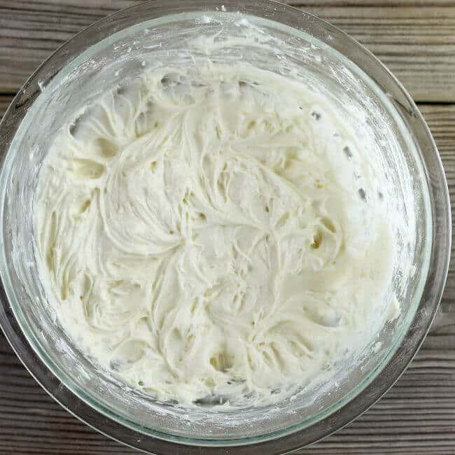 Cream cheese frosting in a bowl.