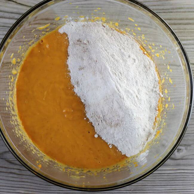 Add the dry ingredients to the pumpkin mixture.