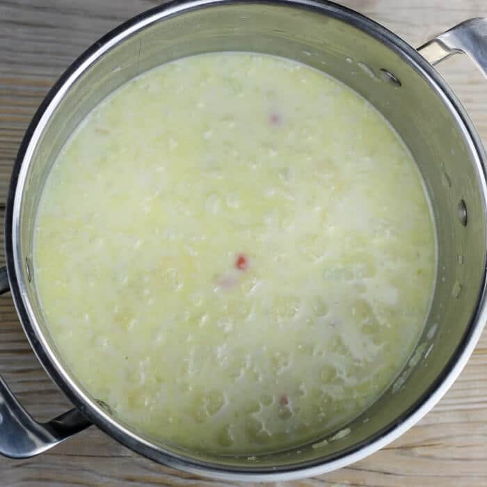Milk is added to the soup.