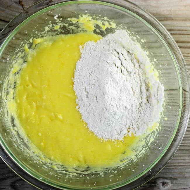 The flour is added to the lemon cake batter.