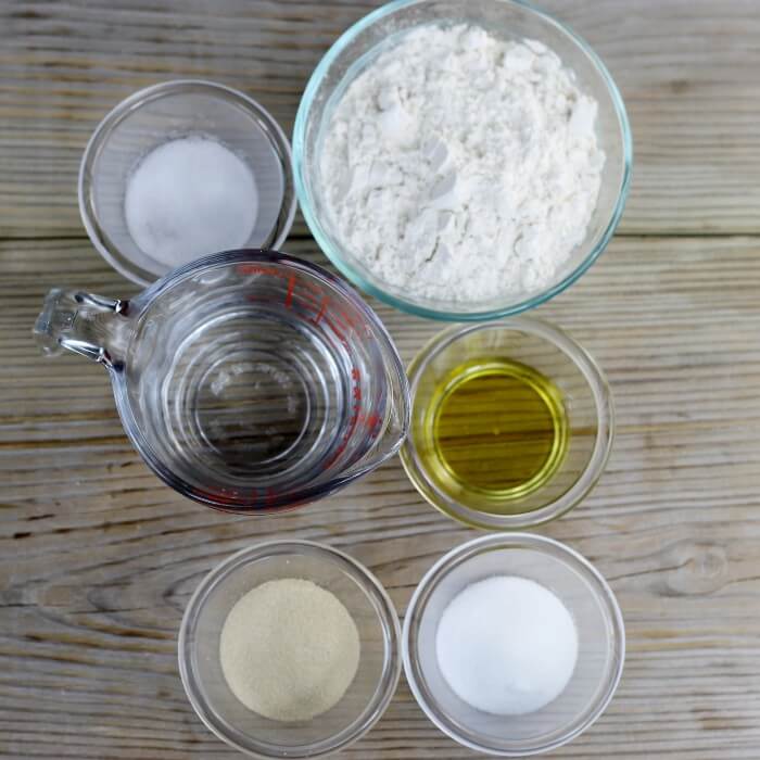 Looking down at ingredients for the pizza crust.