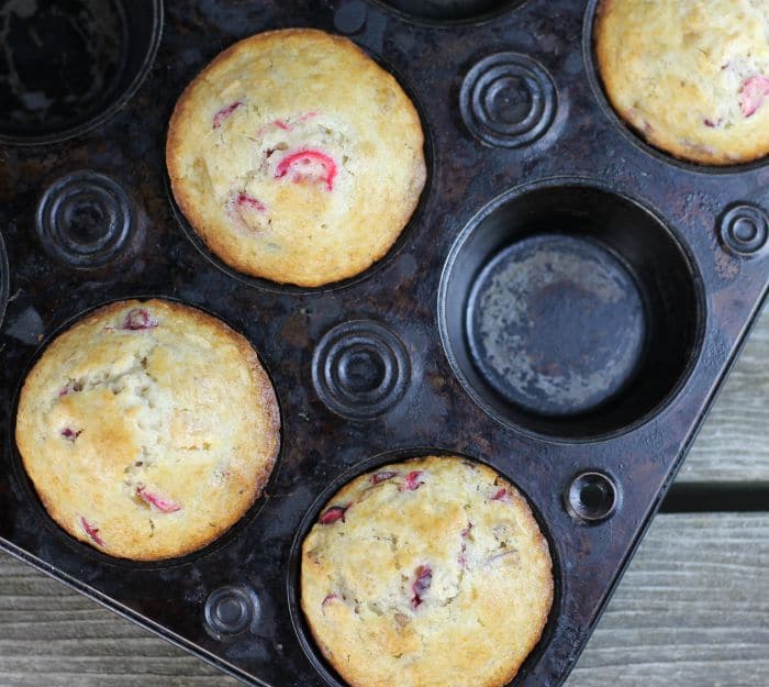 Cranberry Clementine oat muffins filled with fruit, nuts, and oats perfect for breakfast on the go.