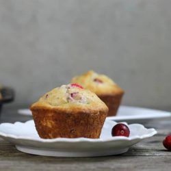 Cranberry Clementine oat muffins filled with fruit, nuts, and oats perfect for breakfast on the go.
