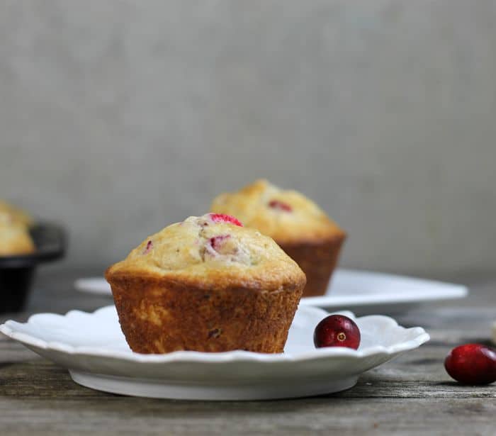 Cranberry Clementine oat muffins filled with fruit, nuts, and oats perfect for breakfast on the go.