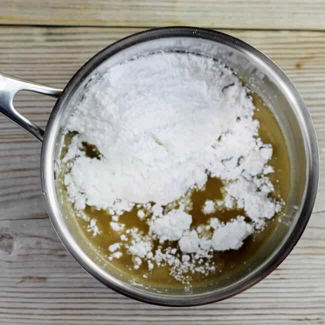 Powdered sugar is added to the brown sugar mixture.