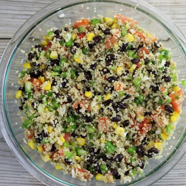 Black bean quinoa salad in a glass bowl.