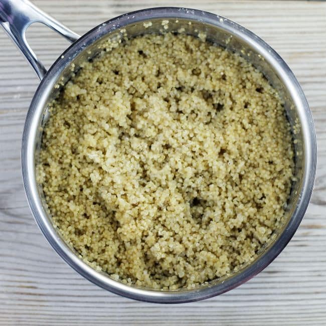 Cooked quinoa in a small pot. 