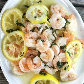Lemon basil shrimp on a white platter.