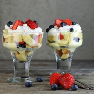 Easy berry trifle a dessert made with cake, pudding, fresh berries and whipped cream simple to make and so delicious.