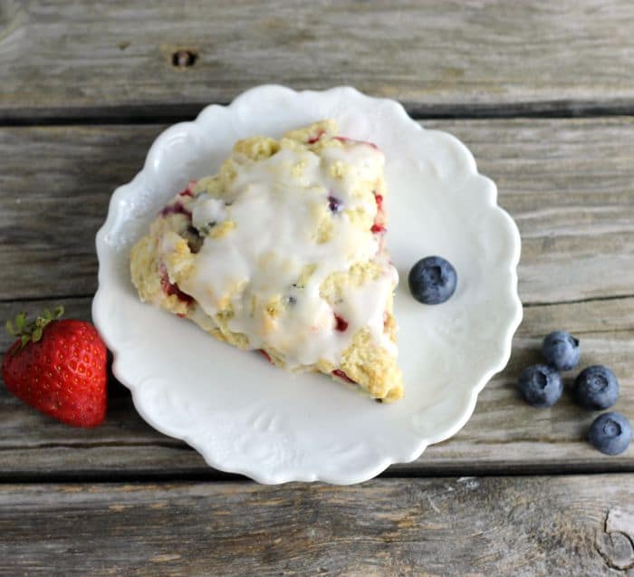 Mixed berry scones are filled with strawberries and blueberries a great way to start your morning off.