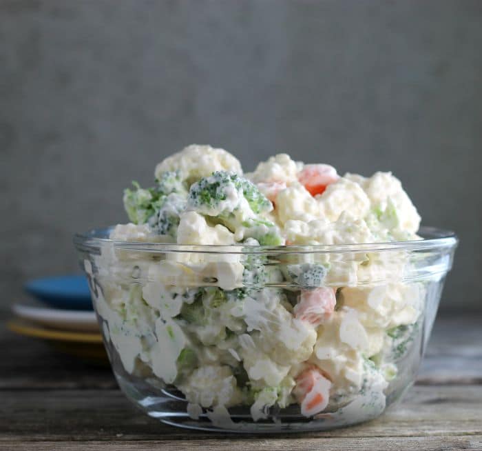 Cauliflower Broccoli Salad is a cold side salad that is covered in a creamy dressing and is a great side dish to make for a large group. 