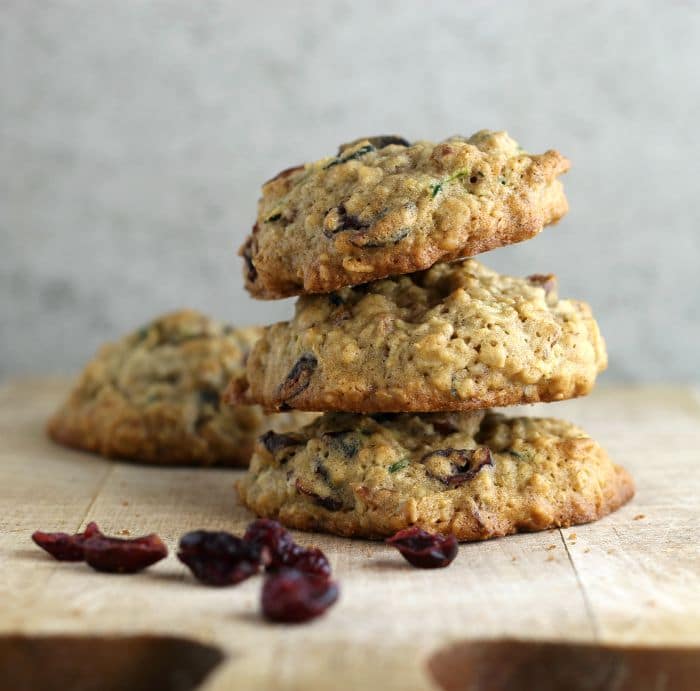Zucchini cranberry oatmeal cookies are cakey cookies that are filled with zucchini, dried cranberries, pecans, and oatmeal.