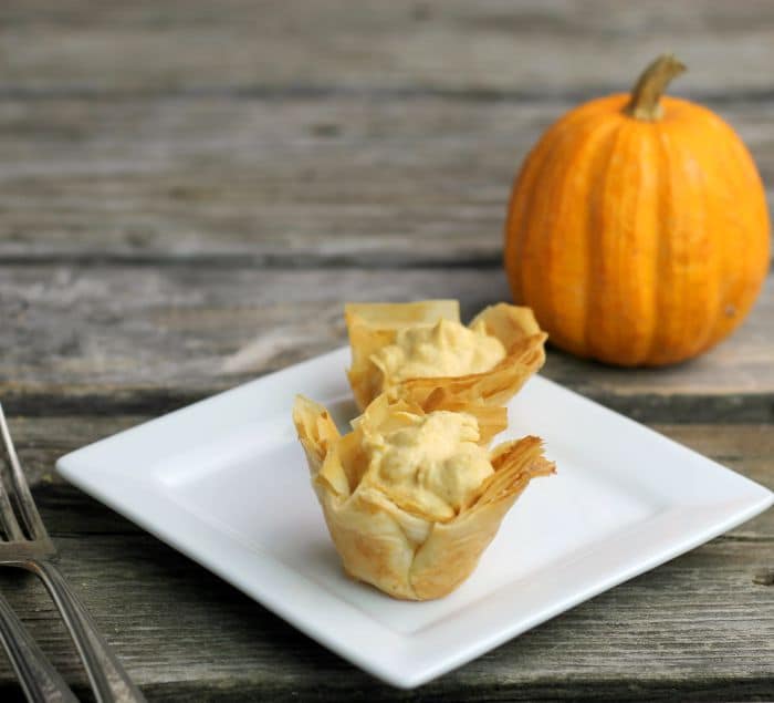 Mini Pumpkin Pie Tarts have a crispy phyllo shell and a no-bake pumpkin cream cheese filling perfect for the holiday season.